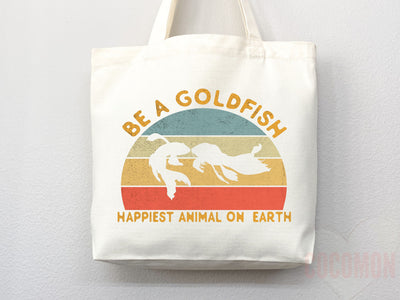 Happiest Animal on Earth Tote Bag, Goldfish silhouettes over a retro striped sunset
